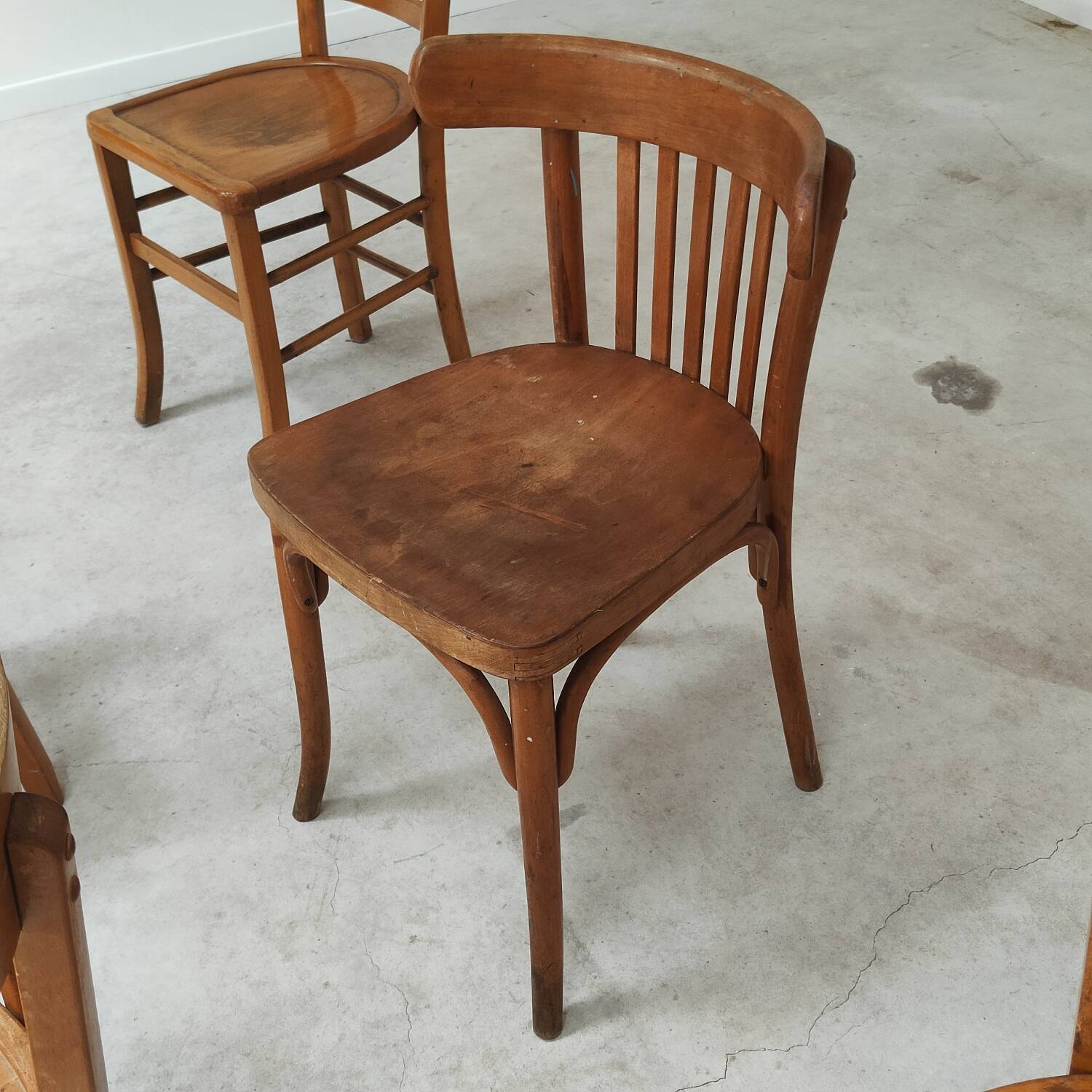 Set of 6 mismatched blond wood bistro chairs