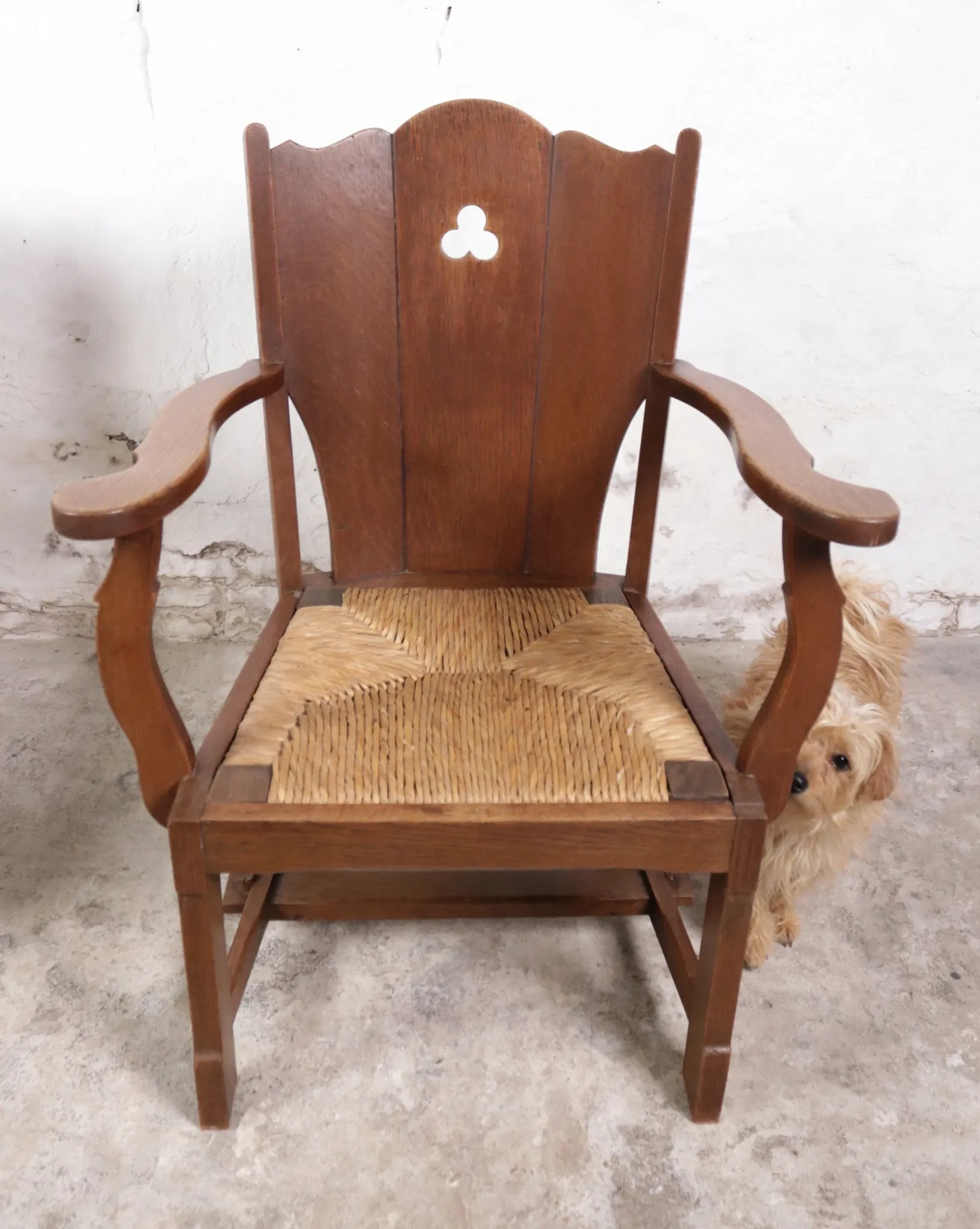 Pair of brutalist oak lounge chairs with rush seats – Netherlands