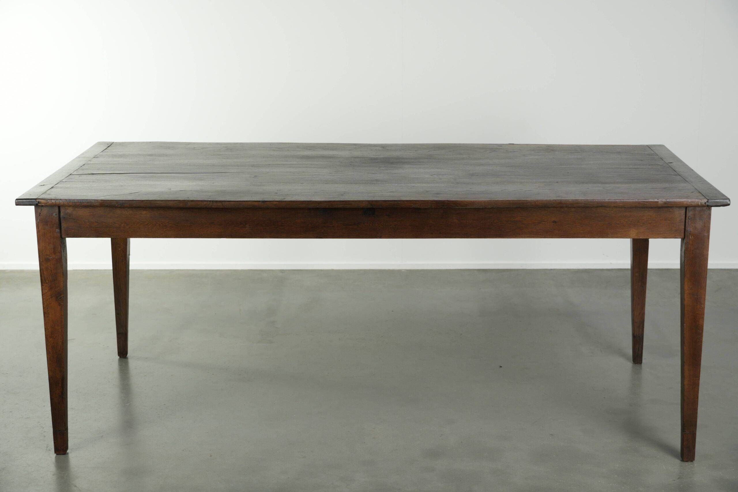 Antique French oak dining table from the early 19th century
