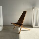 Foldable designer armchair in wooden slats
