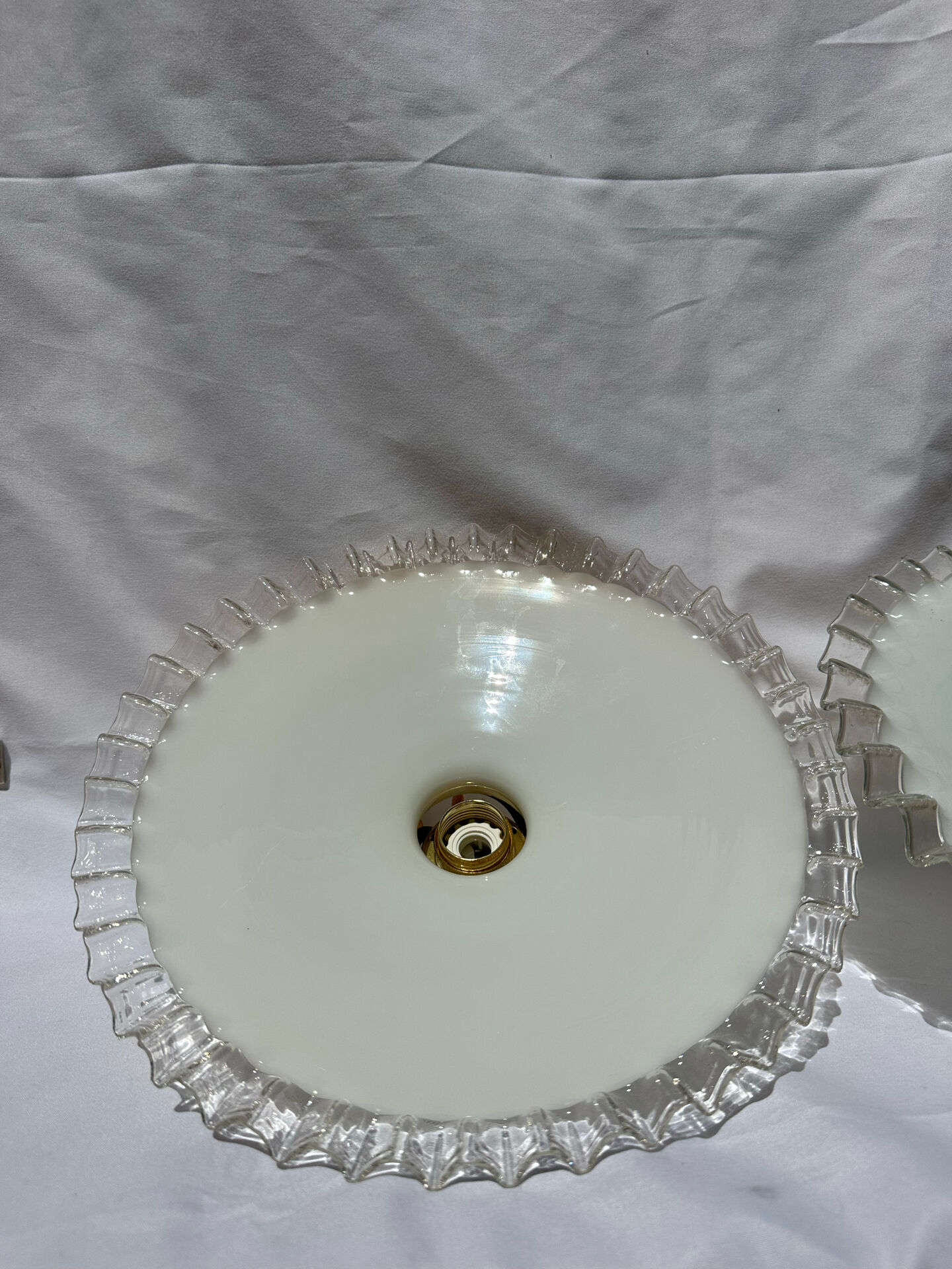Vintage wavy opaline suspension pair with brass claw