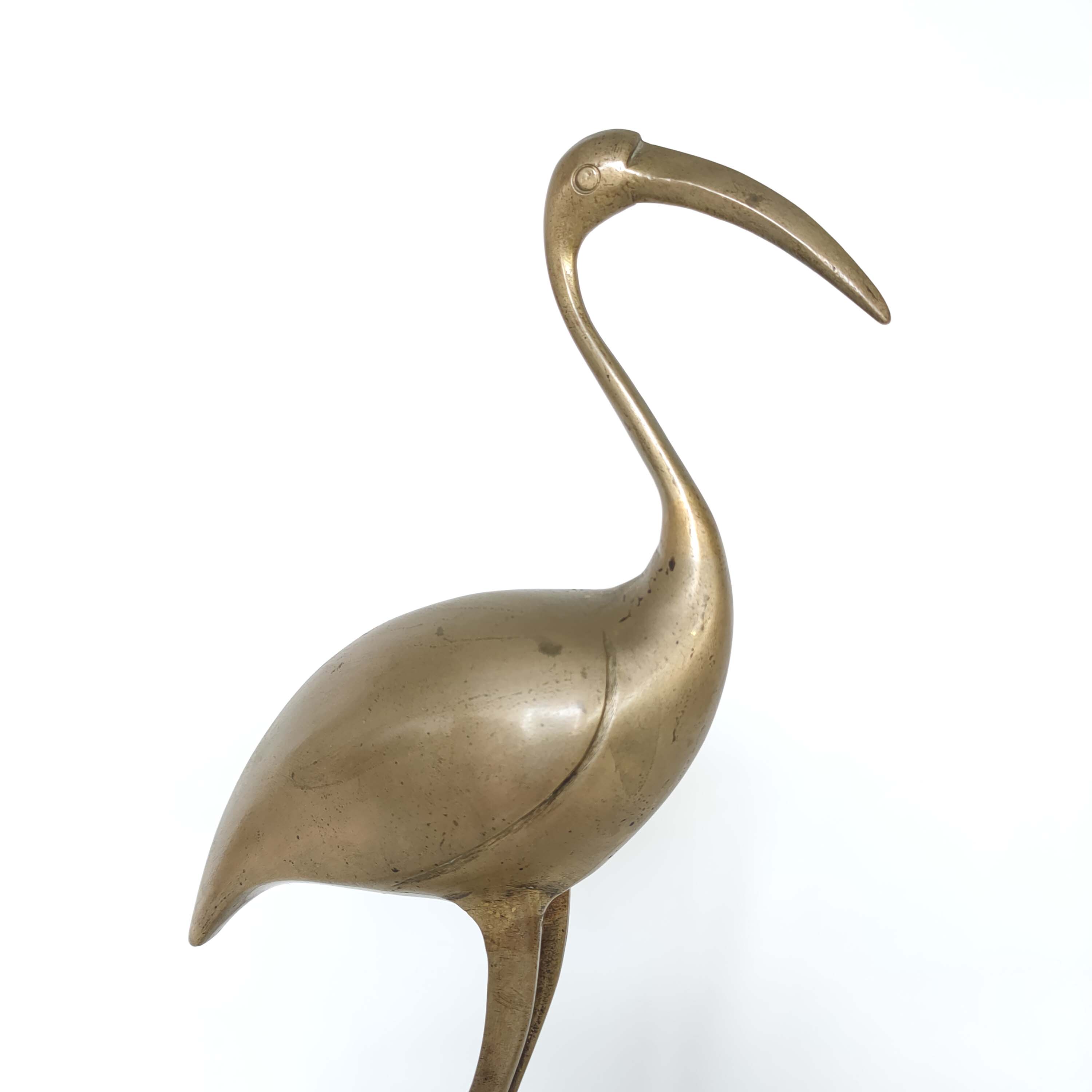 Brass heron