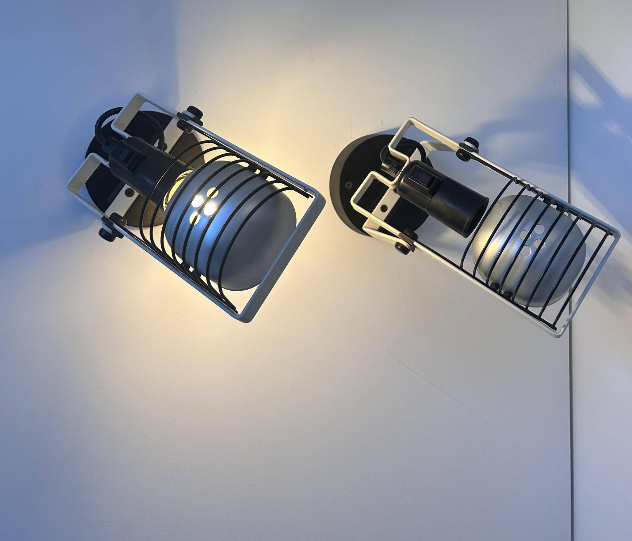Pair of vintage Sintesi adjustable wall lights, by Gismonti for Artemide, Italy 1975