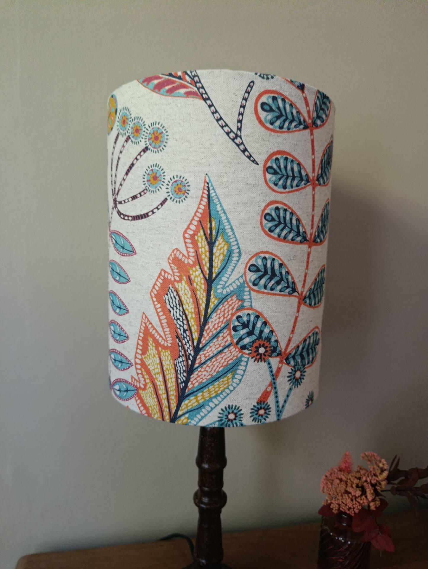 Aged metal table lamp, botanical shade