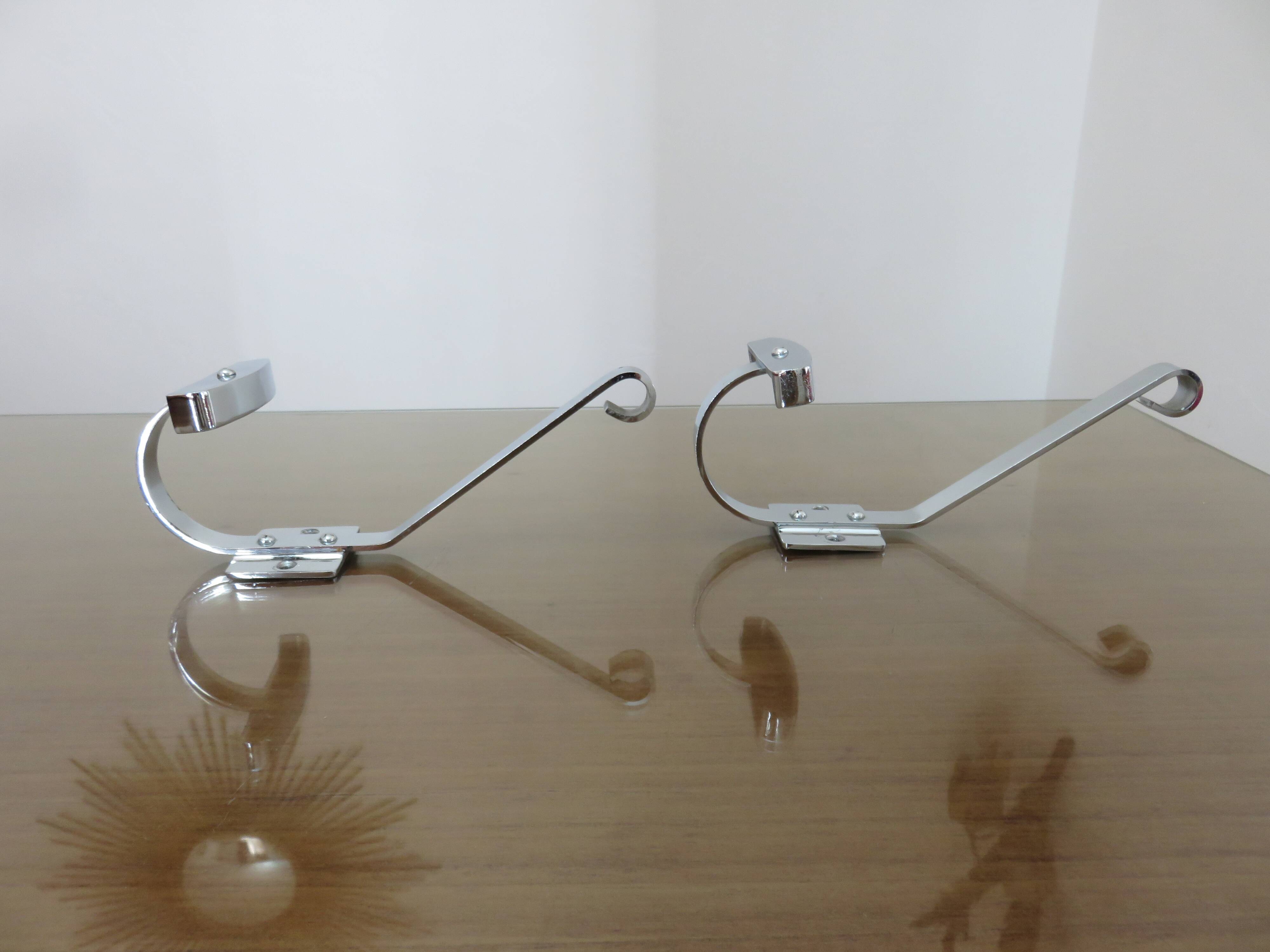 Pair of chrome metal coat hooks from the 1970s.