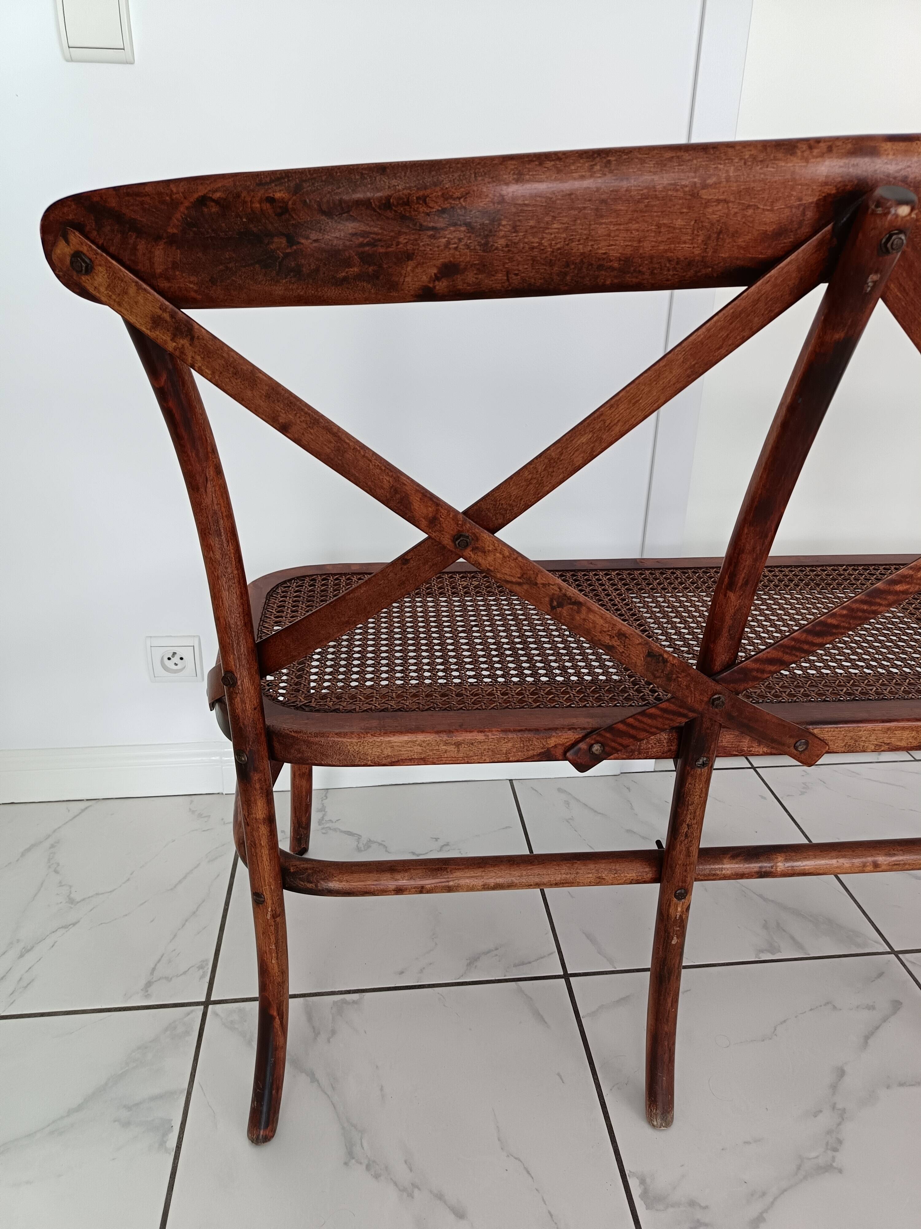CURVED WOOD AND CANE BENCH