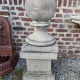 Ball on base in gray patinated reconstituted stone