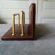 Letter holder covered in leather and golden metal by roche design