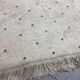 White berbere wool carpet with black dots 200x290cm