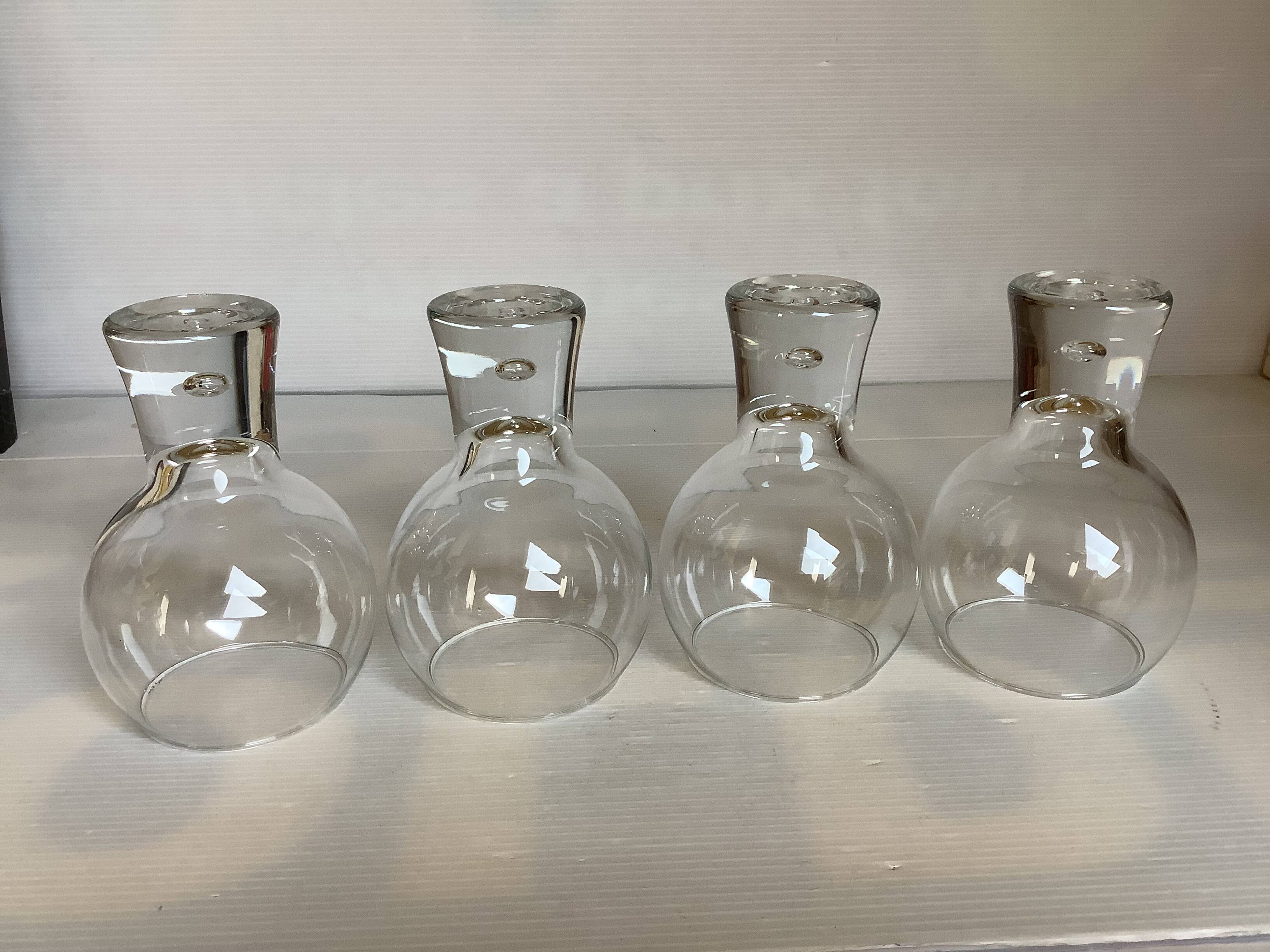 Four large bubble-style glasses by Kosta Boda.