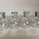 Four large bubble-style glasses by Kosta Boda.
