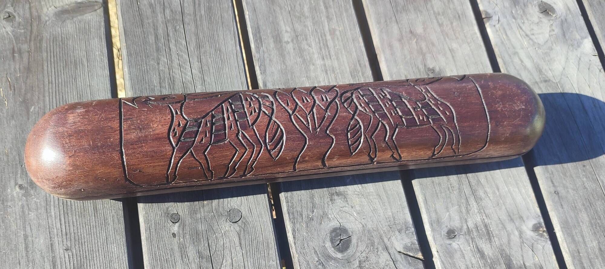 Traditional carved wooden Awalé game Mancala