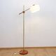 Floor lamp with a swivelling arm