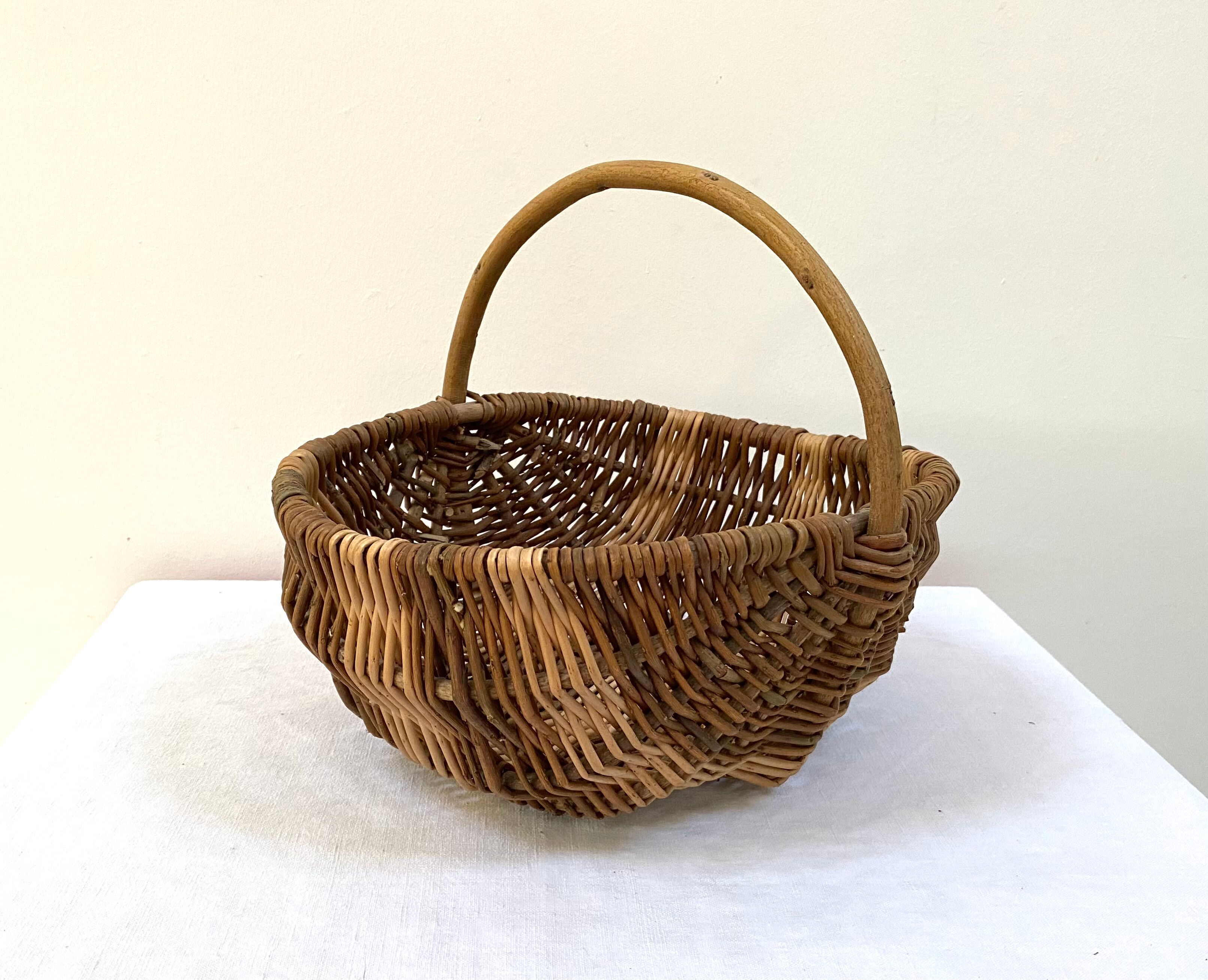 Old handmade basket in woven wicker