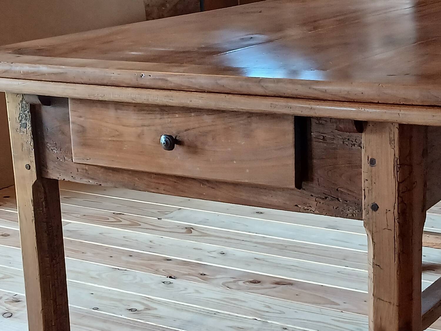 Elm farmhouse table with extensions for 6 to 10 people.