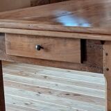 Elm farmhouse table with extensions for 6 to 10 people.