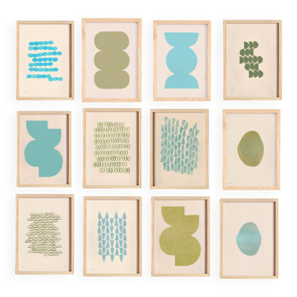 Collection of 12 framed paintings on paper, cool colours.