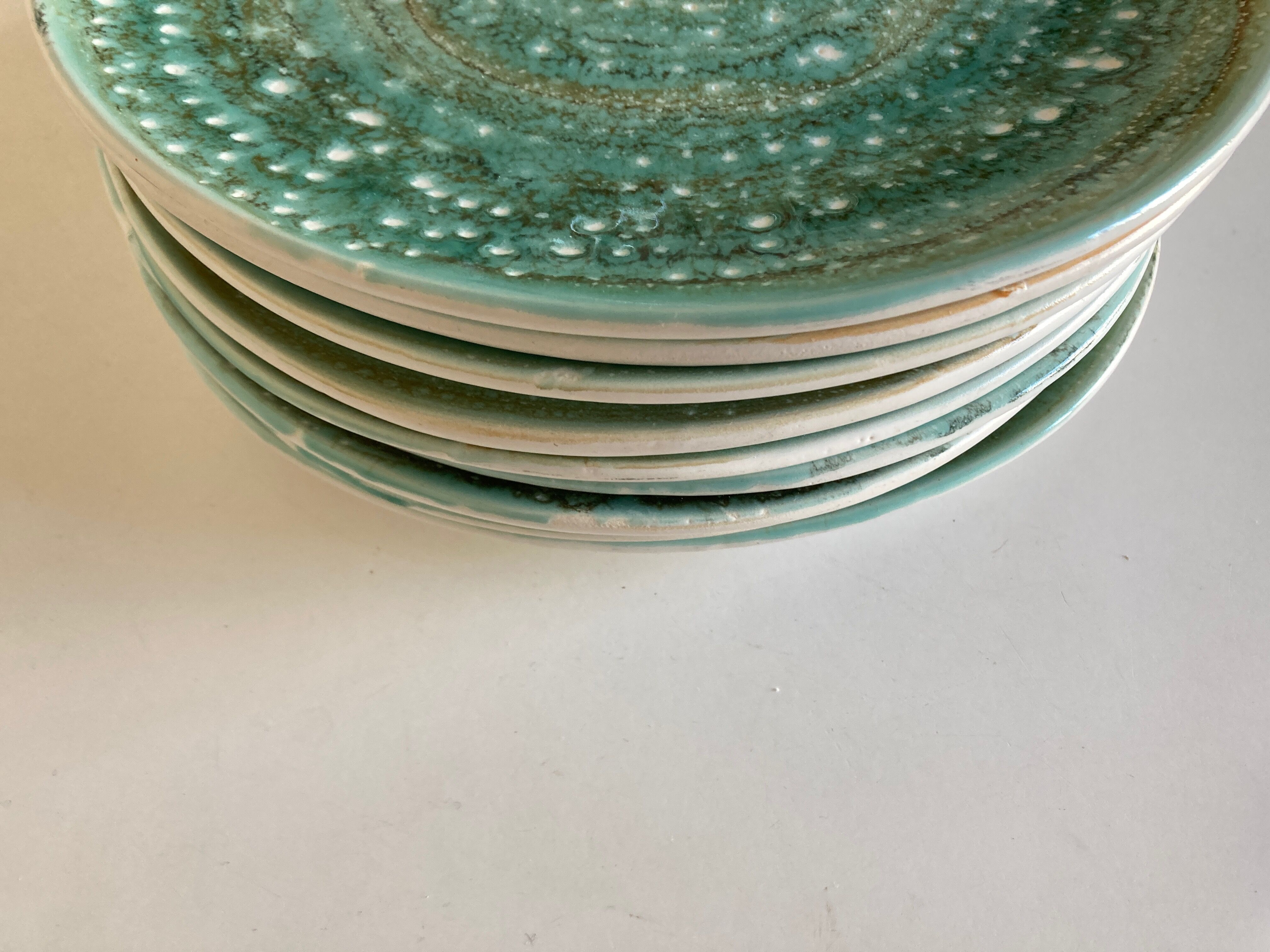 Set of 9 plates 1970 in stoneware Mousse de Nierderviller