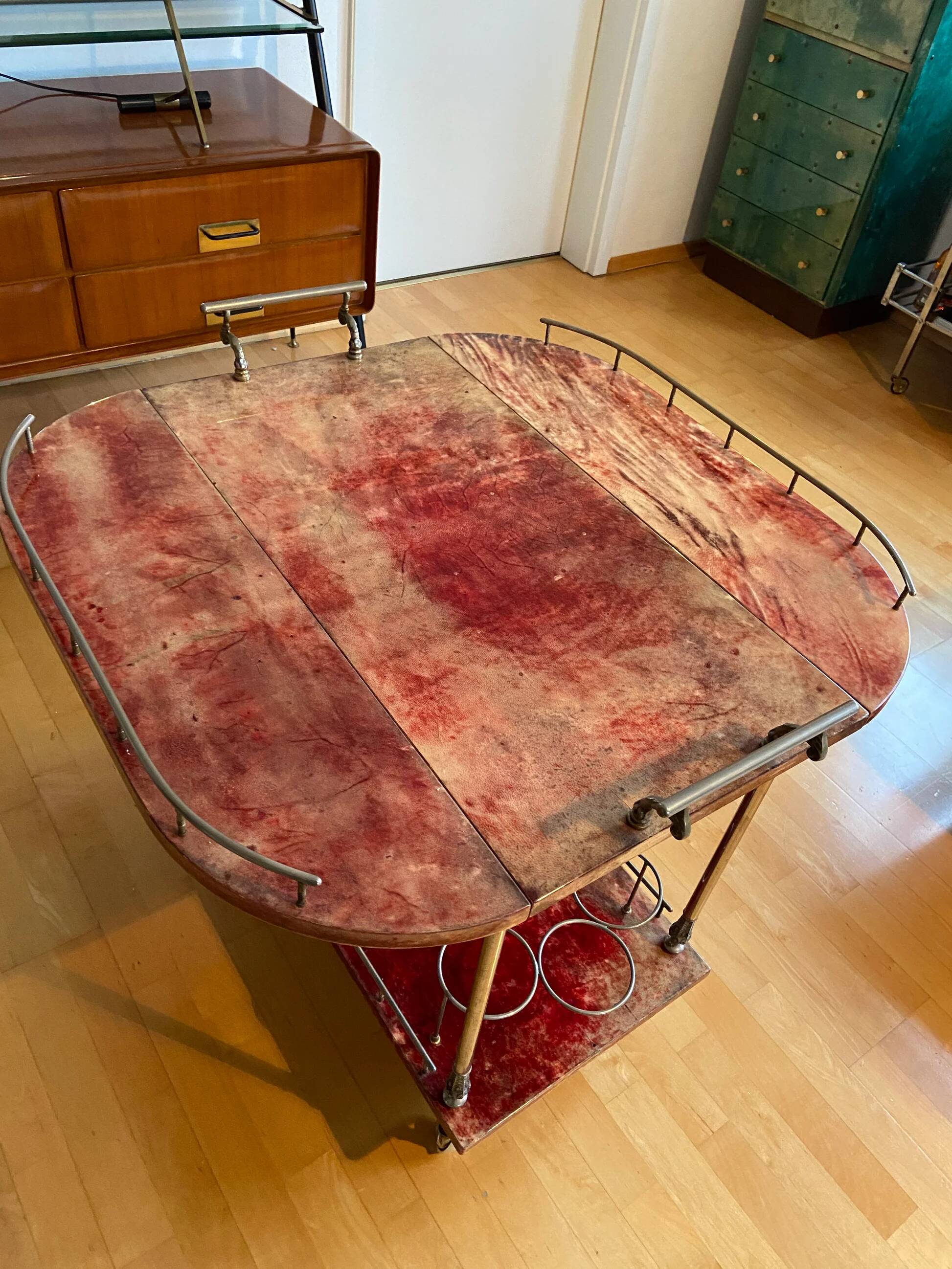 Red bar cart by ALDO TURA with folding sides, Italy, 1960s
