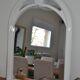 White mirror in 90s Art Deco style