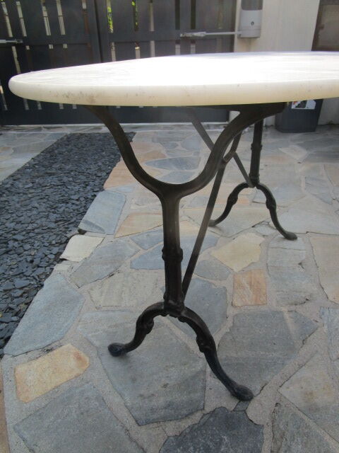 Antique marble bistro table and cast iron foot
