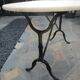 Antique marble bistro table and cast iron foot