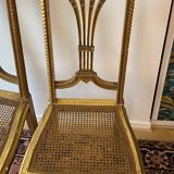Pair of Louis XVI style fluted gilded chairs