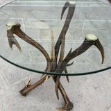 Vintage pedestal table from the 50s in vintage horns