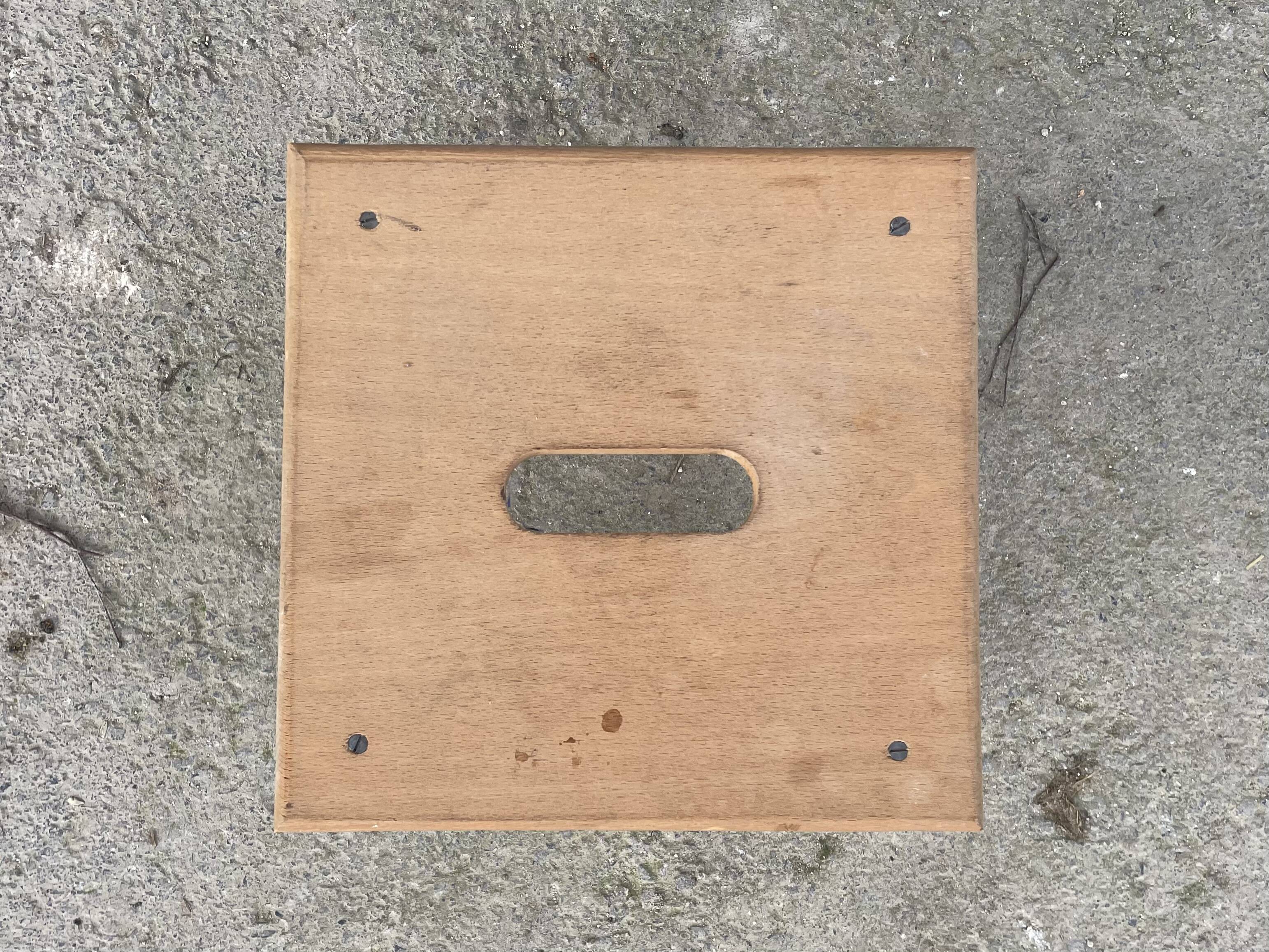 Small low wooden stool