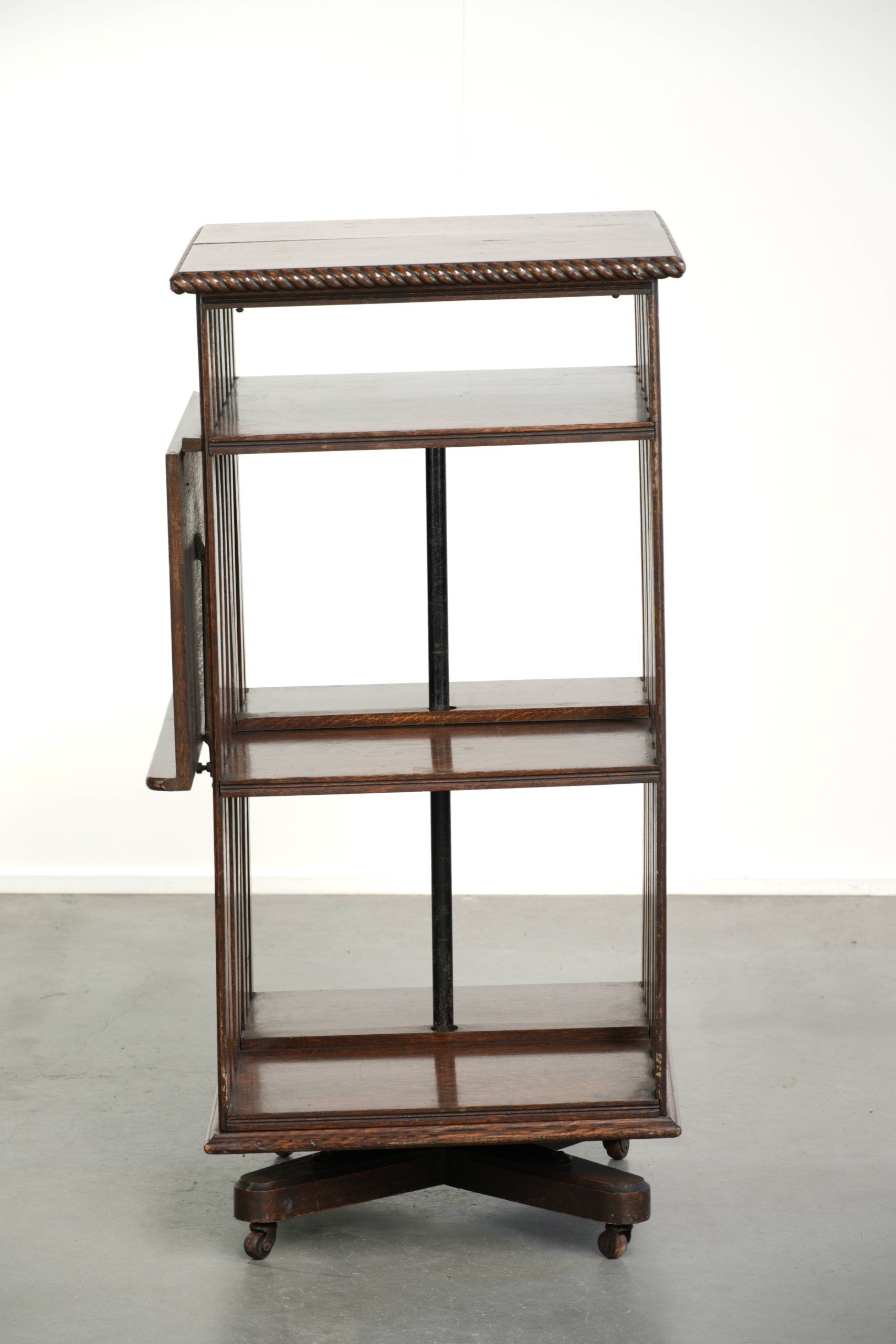 Large antique English oak book carousel from the 19th century