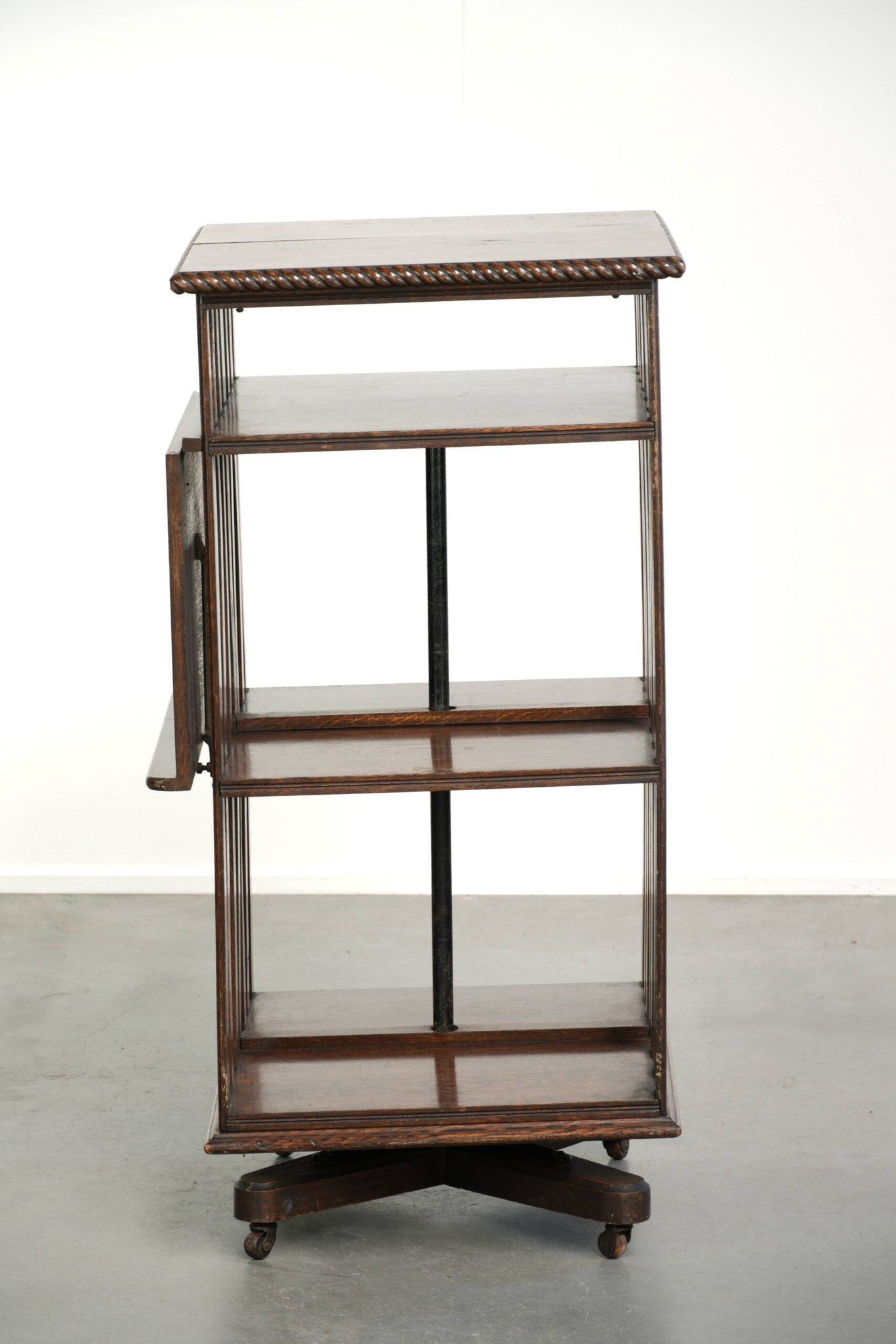 Large antique English oak book carousel from the 19th century