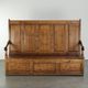 Antique English oak hall bench from the early 19th century with storage space
