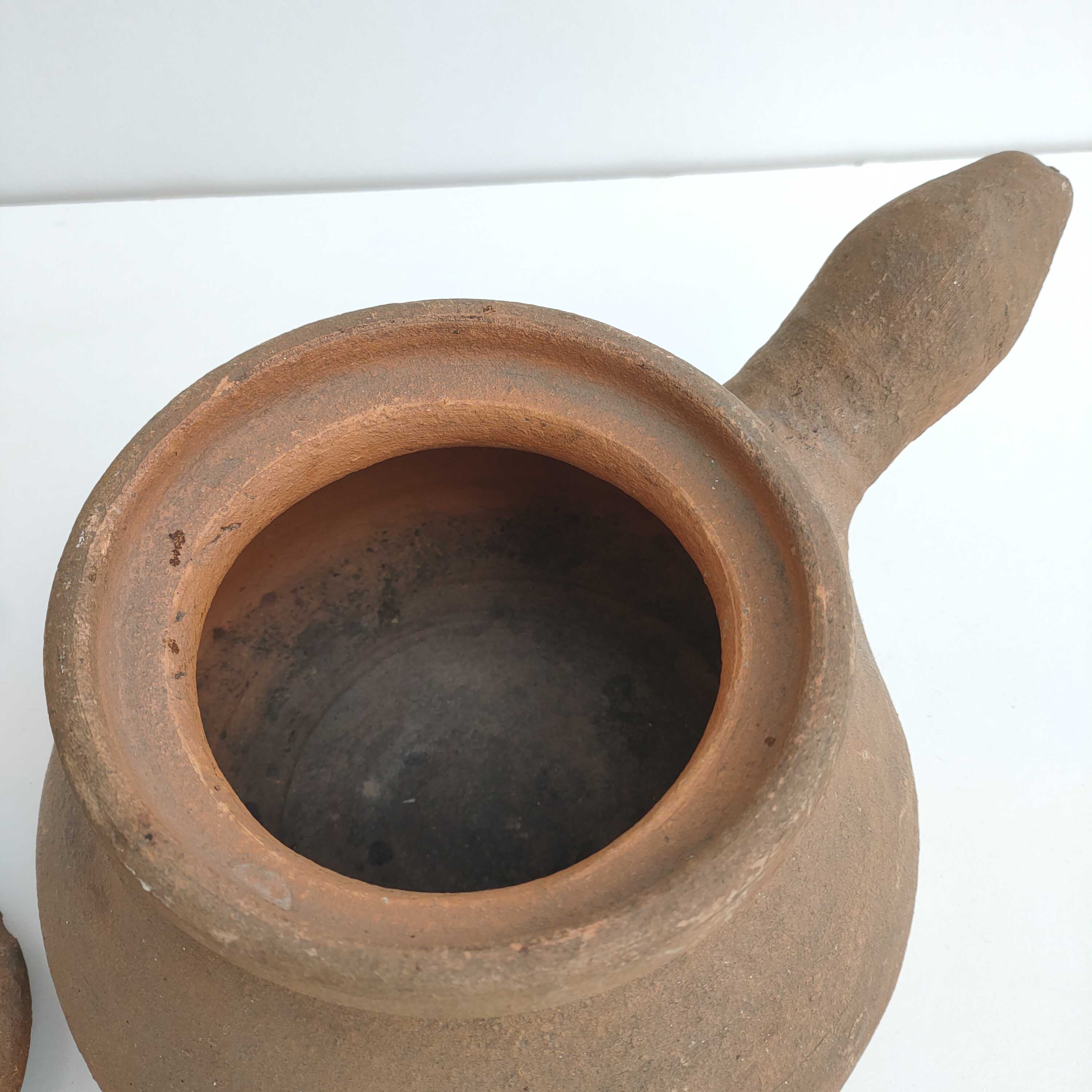 Ancient terracotta "devil" casserole