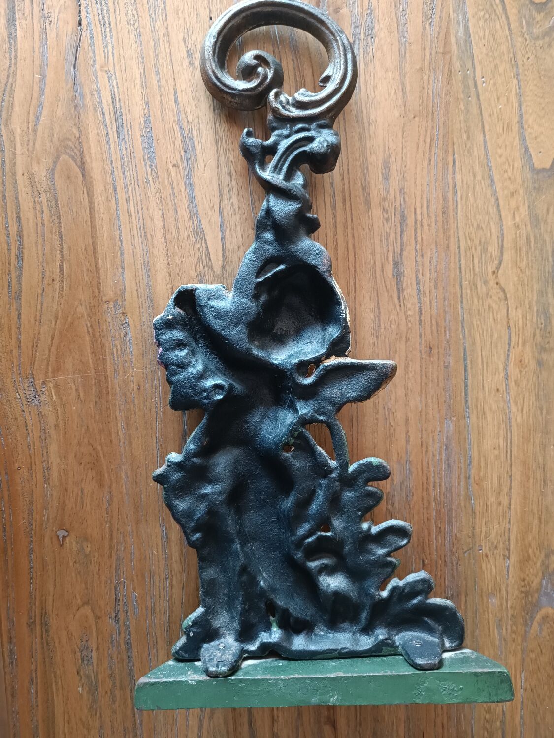Cast iron door block cherub