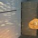 Mid-century modern Danish extendable cantilever wall lamp with a rattan shade, 1960s.