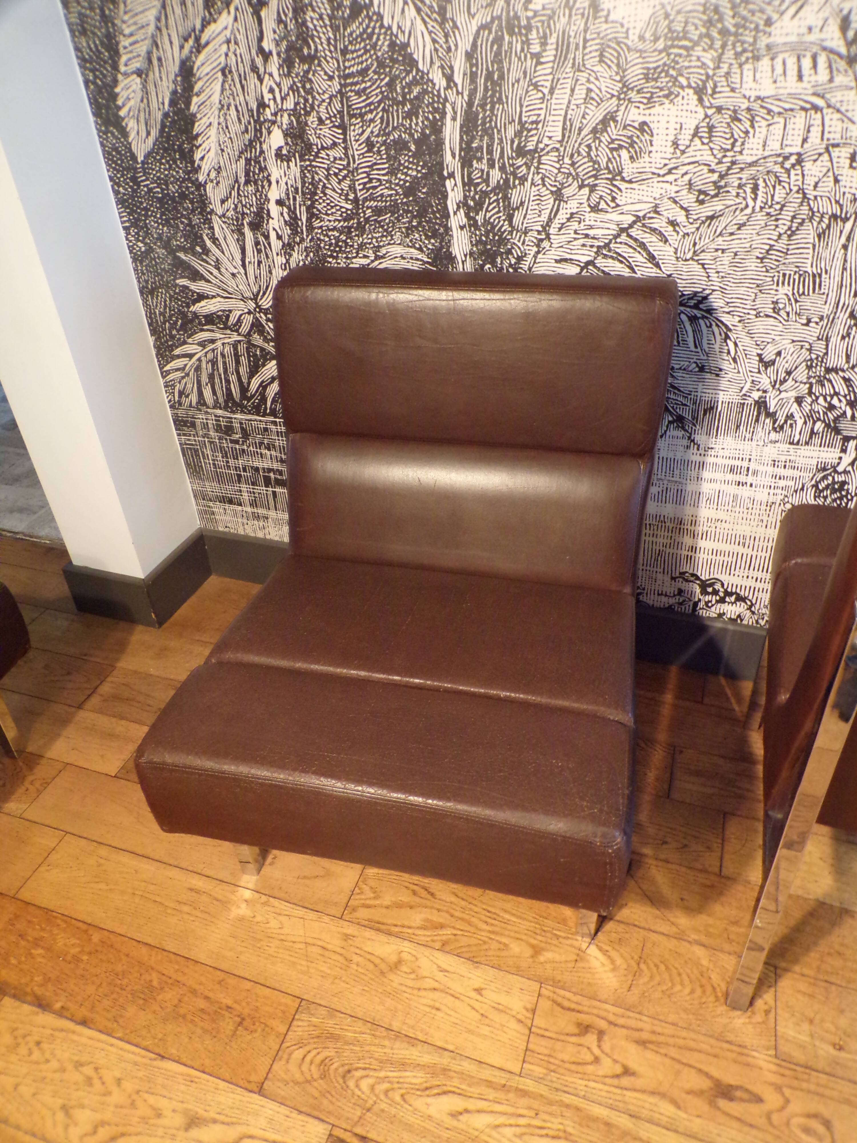 Trio of vinco armchairs in imitation leather