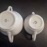1 milk jug and 1 sugar jar