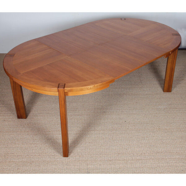 Round extendable dining table in wood published by Monopoly, 1970.
