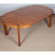 Round extendable dining table in wood published by Monopoly, 1970.