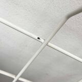 Minimalist white German mid-century coat rack with strings from the 1960s.