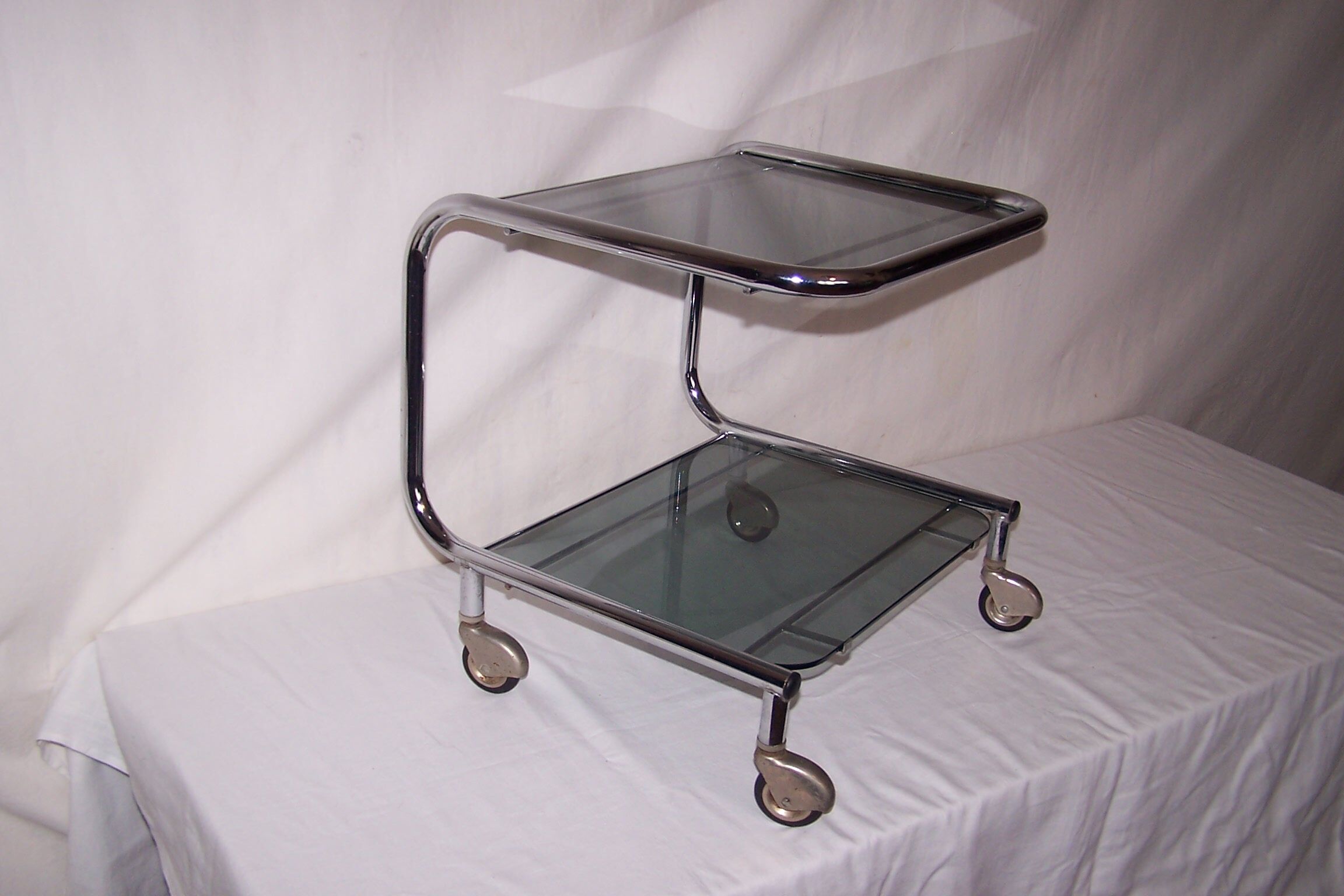 Wheeled serving table 70