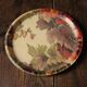 Round unbreakable plastic tray with vintage foliage