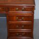 Partner desk with double pedestal in burr yew wood with decorated top.