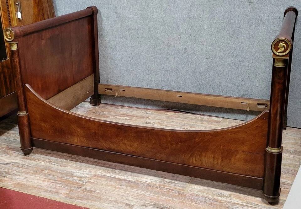 Rare Empire period mahogany bed with gilt bronze profiles circa 1800