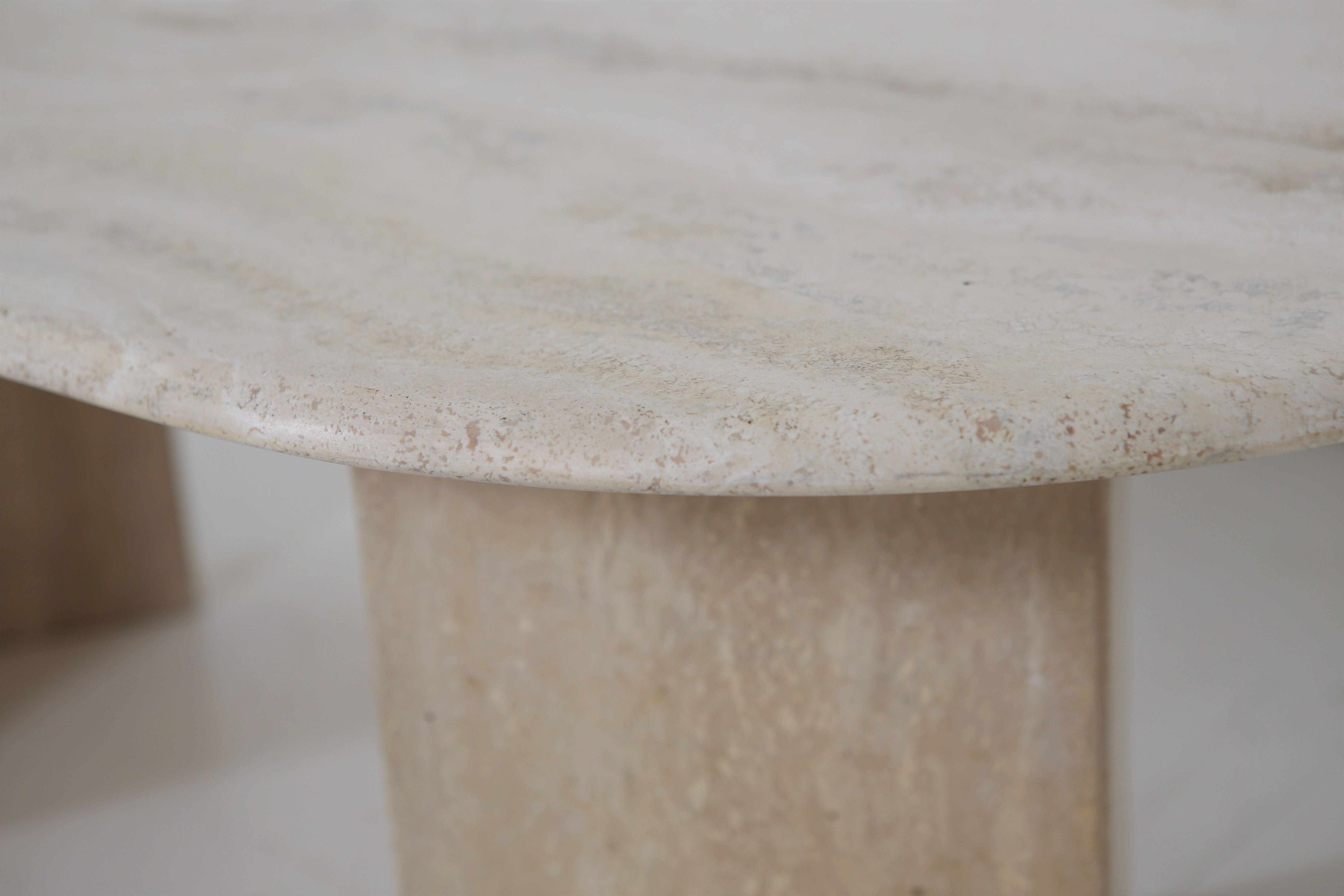 Oval travertine coffee table