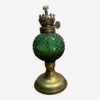 Old green oil lamp