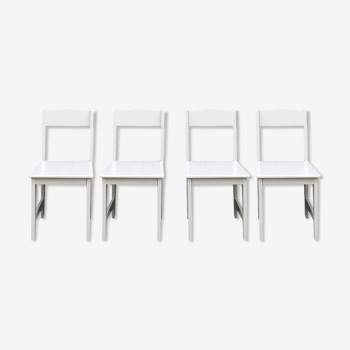 4 modern laquered wooden chairs.