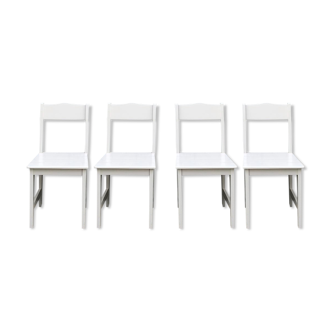 4 modern laquered wooden chairs.