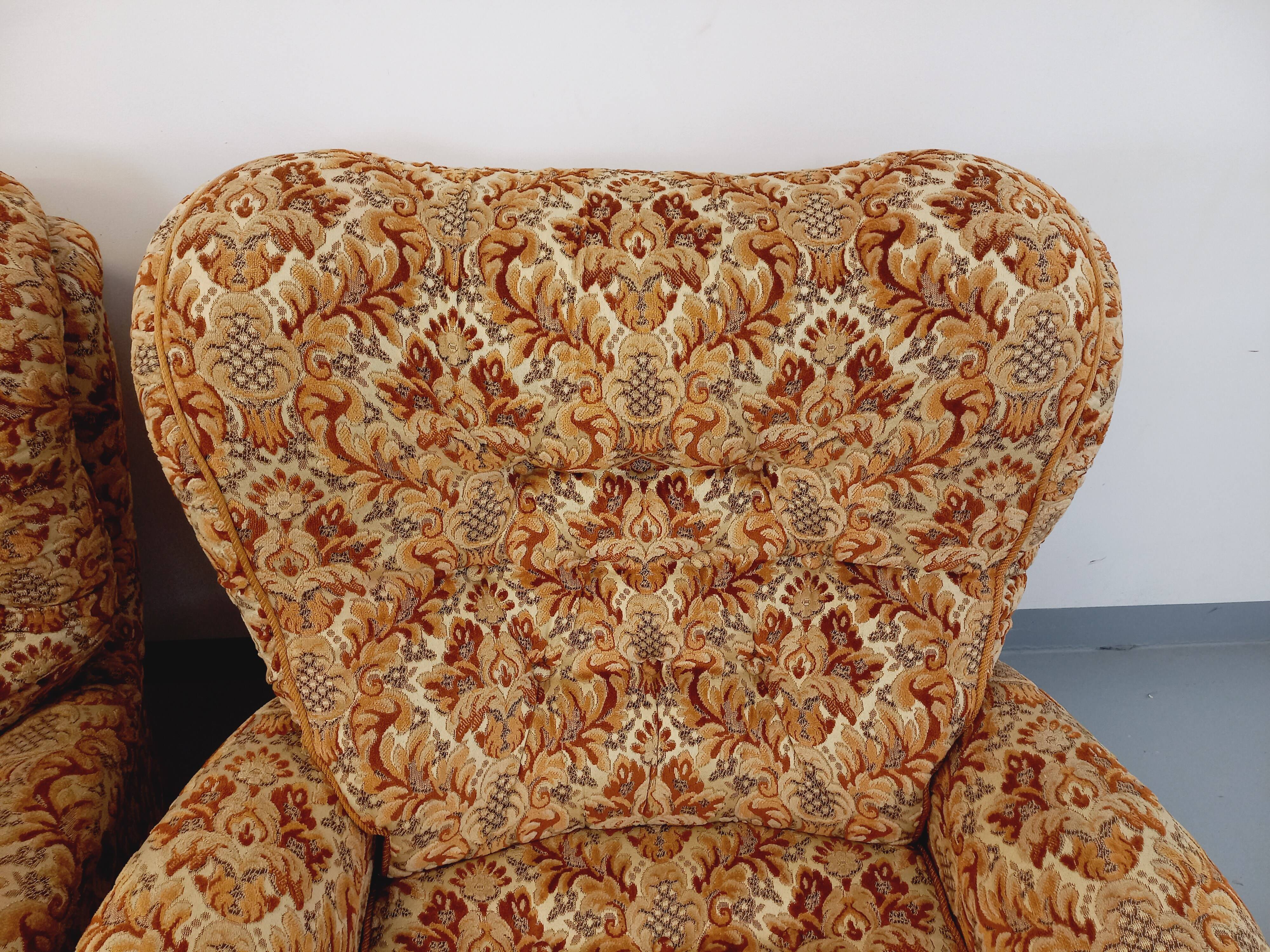 Set of 2 vintage armchairs in floral fabric with fringes from the 60s 70s