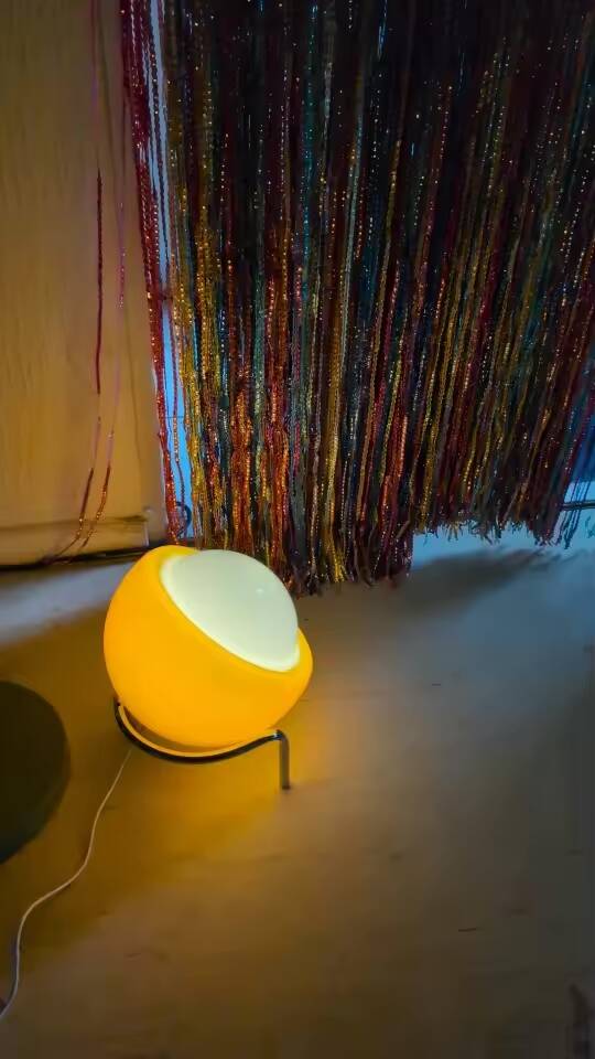 Orange table lamp in Bauhaus style